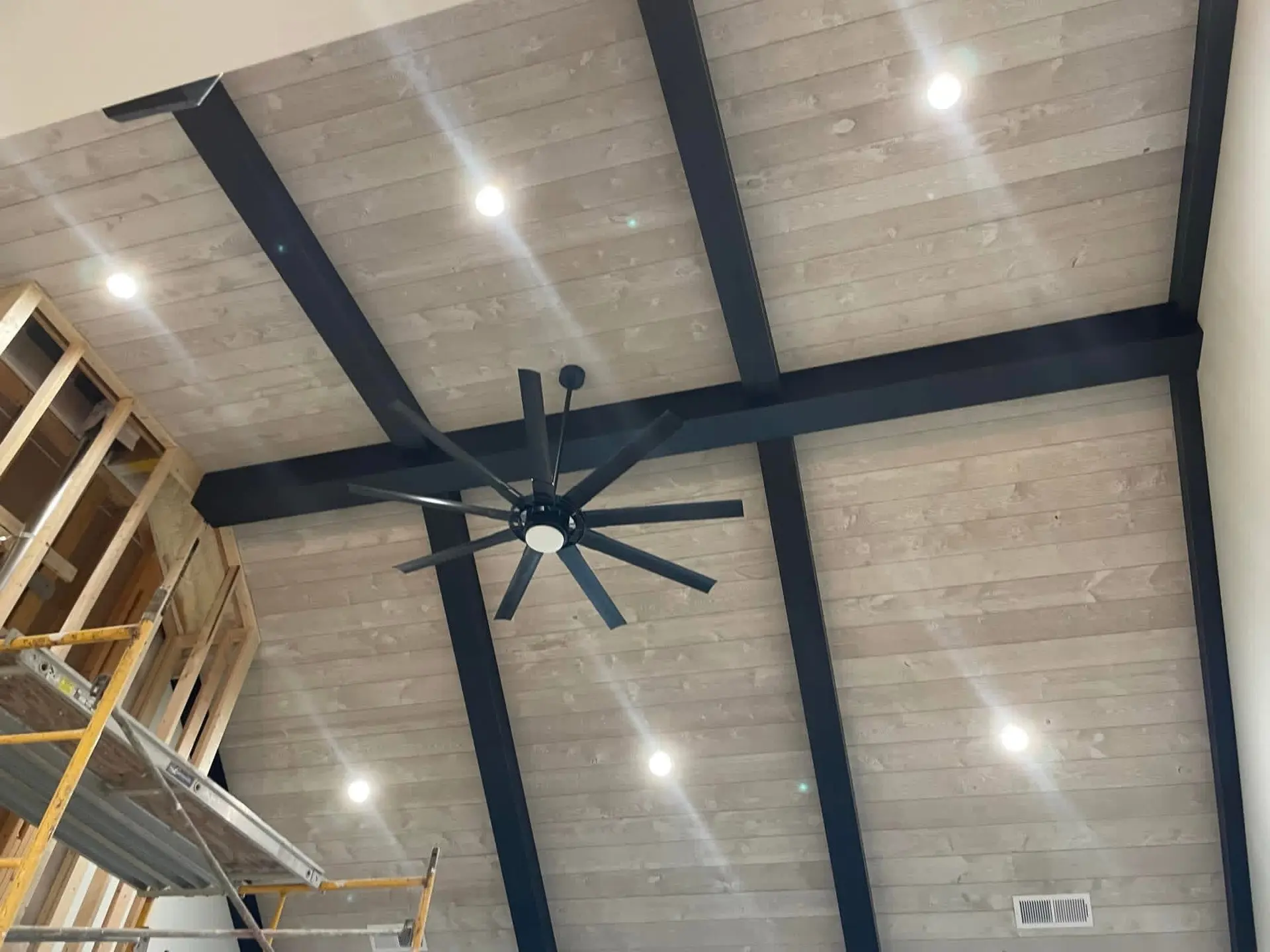 Vaulted ceiling recessed lighting and ceiling fan installation by LiveWire Electrical Service